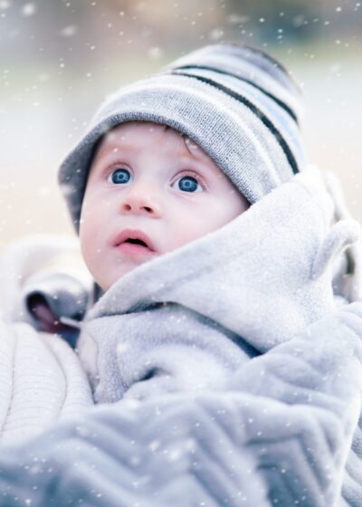 Image of cute baby in white snow